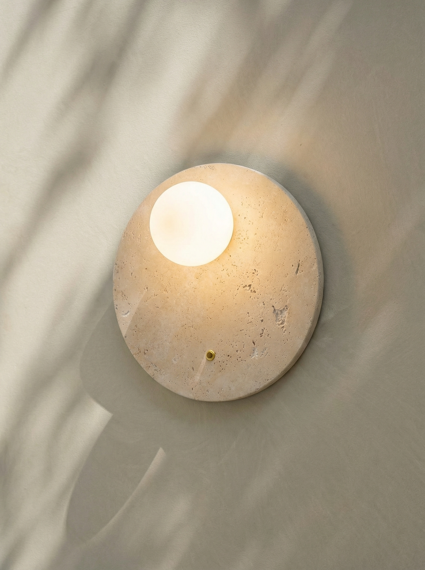 Gine | Runde Wandleuchte aus Travertin